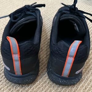 Women’s NIKE Shield Sneakers